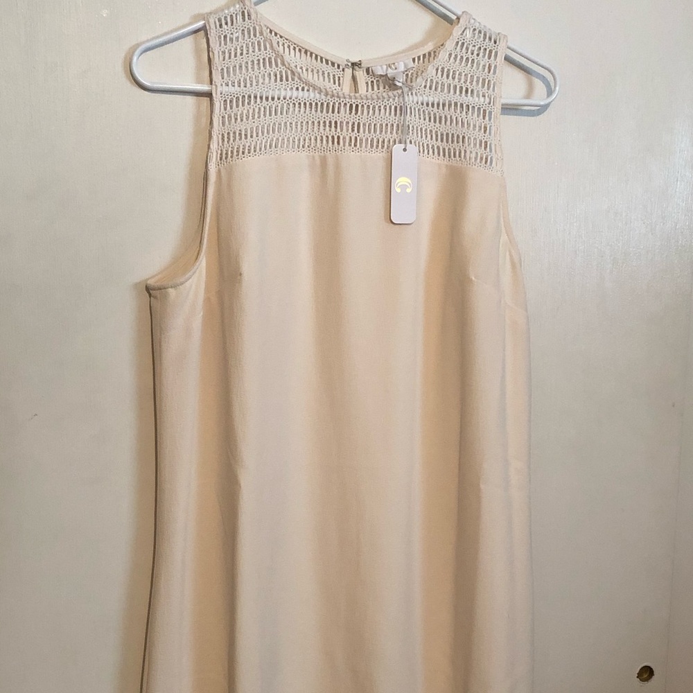 Ivory crocheted top dress, size large.